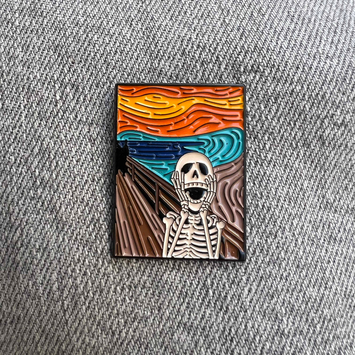 The Screamer Skull Enamel Pin