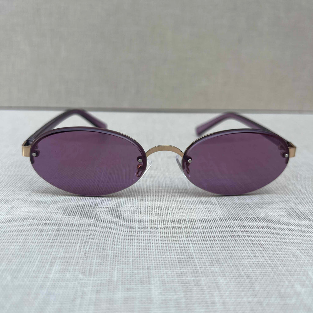 Purple Rimless Oval Sunglasses